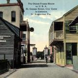 The Oldest Frame House in U. S. A. St. George Street, City Gates in distance.
