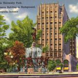 Fountain in University Park. Chamber of Commerce Building in Background