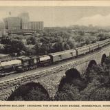 The Empire Builder crossing The Stone Arch Bridge