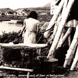 Wash Day in Unalaska, showing part of town in background